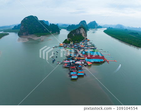 Aerial view of Panyee island in Phang Nga Thailand,High angle view Floating village, Koh Panyee fishing village island in Phang Nga, Thailand Aerial view of Panyee island in Phang Nga Thailand,High angle view Floating village, Koh Panyee fishing village island in Phang Nga, Thailand 109104554