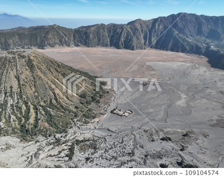 Aerial view Mountains at Bromo volcano during sunny sky,Beautiful Mountains Penanjakan in Bromo Tengger Semeru National Park,East Java,Indonesia.Nature landscape background Aerial view Mountains at Bromo volcano during sunny sky,Beautiful Mountains Penanjakan in Bromo Tengger Semeru National Park,East Java,Indonesia.Nature landscape background 109104574