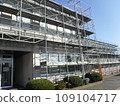 Build scaffolding for exterior renovation 109104717