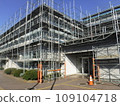Build scaffolding for exterior renovation 109104718