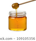 Golden Honey Drip from Wooden Dipper 109105356