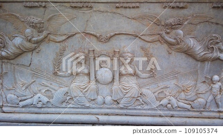 Relief at the entrance of Carlos V Palace, painting of an angel victorious in battle [Granada, Spain] 109105374