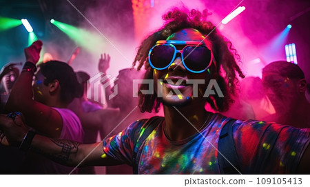 Large group of young people are dancing in a nightclub. 109105413