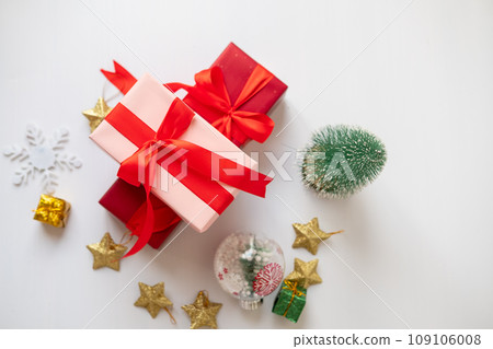 Christmas elements, gifts, fir branches, red decorations on white background. Christmas concept, winter, new year 109106008