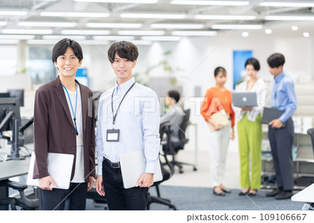 Young male and female engineers having a meeting in the office 109106667