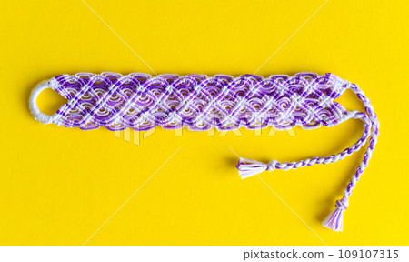 DIY woven tied friendship bracelet with unusual braiding. Summer accessory 109107315
