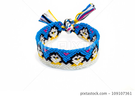 DIY woven tied friendship bracelet with unusual braiding. Summer accessory 109107361