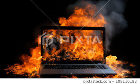 Burning laptop and keyboard, equipment fire due to faulty battery and wiring. Laptop Computer setting the world on fire. Burning laptop and keyboard, equipment fire due to faulty battery and wiring. Laptop Computer setting the world on fire. 109110188