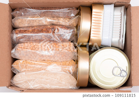 Carton Box with Canned Food, Cereals and Grocery - Donation Box or Food Reserves Carton Box with Canned Food, Cereals and Grocery - Donation Box or Food Reserves 109111815