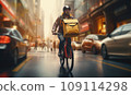 Focused young male delivery man in protective helmet riding bicycle with cardboard boxes on street in city 109114298
