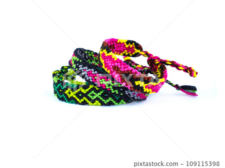 DIY woven friendship bracelets with different braiding. Summer accessory DIY woven friendship bracelets with different braiding. Summer accessory 109115398