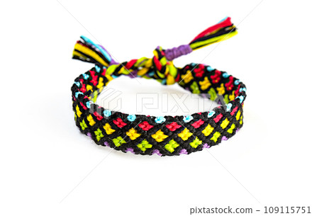 DIY woven friendship bracelets with different braiding. Summer accessory 109115751