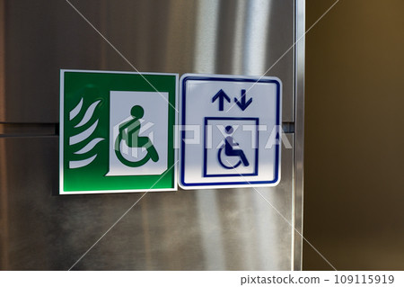 Wheelchair and fireproof elevator sign for people with disabilities. Symbol to help people evacuate a building Wheelchair and fireproof elevator sign for people with disabilities. Symbol to help people evacuate a building 109115919