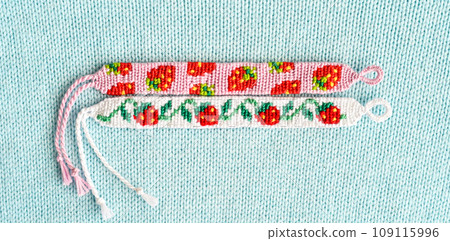 DIY woven friendship bracelets with different braiding. Summer accessory 109115996