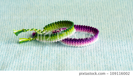 DIY woven friendship bracelets with different braiding. Summer accessory DIY woven friendship bracelets with different braiding. Summer accessory 109116002