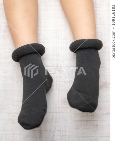 Feet wearing socks Feet wearing socks 109116183