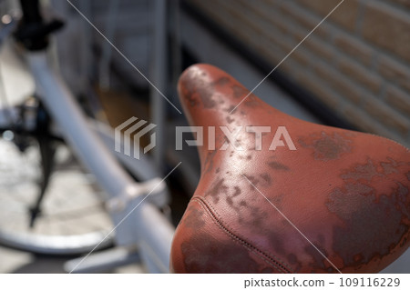 old bicycle saddle 109116229