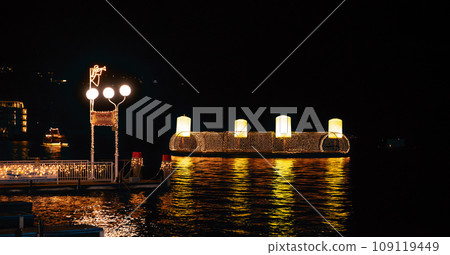 Velden, Austria - November 24, 2023: Opening of Advent on the bank of Lake Woerthersee, sales of Christmas goods at the advent market, Christmas illumination 109119449