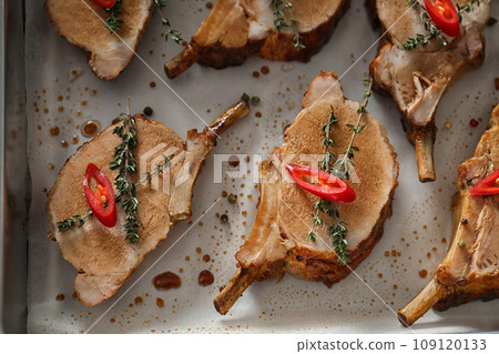 Delicious roasted ribs in baking tray, flat lay Delicious roasted ribs in baking tray, flat lay 109120133