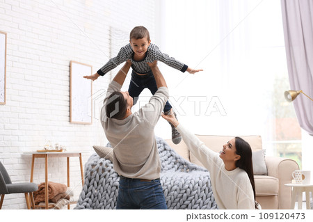 Happy family with little son having fun at home. Winter vacation 109120473