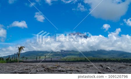 Eruption of Volcano Semeru on the island of Java. The volcano emits ash and smoke. Natural disaster. December 2022. Eruption of Volcano Semeru on the island of Java. The volcano emits ash and smoke. Natural disaster. December 2022. 109120796