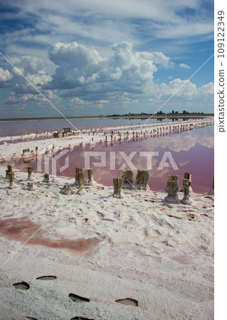 Clouds landscape water and horizon - salt mining plant Clouds landscape water and horizon - salt mining plant 109122349