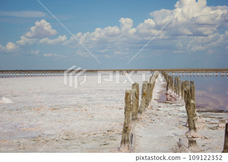 Clouds landscape water and horizon - salt mining plant 109122352