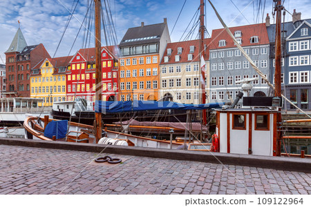 Copenhagen. Nyhavn canal colorful traditional houses and city embankment at sunrise. Copenhagen. Nyhavn canal colorful traditional houses and city embankment at sunrise. 109122964
