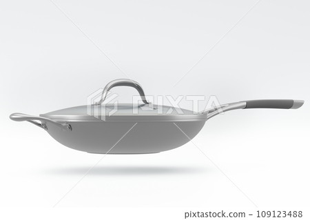 Stainless steel frying pan with glass lid and chrome cookware on white 109123488