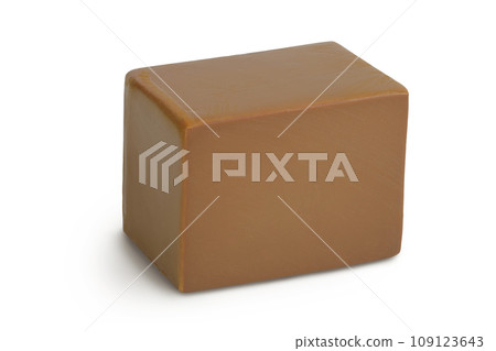 Brown cheese. Norwegian brunost isolated on white background with full depth of field Brown cheese. Norwegian brunost isolated on white background with full depth of field 109123643