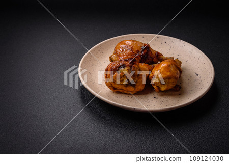 Delicious Asian dish with chicken legs in teriyaki sauce with salt and spices 109124030