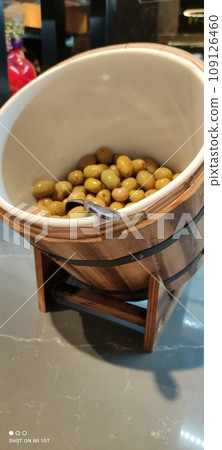 Olives in beautiful dishes in the assortment of a restaurant in one of the hotels in Turkey Olives in beautiful dishes in the assortment of a restaurant in one of the hotels in Turkey 109126460