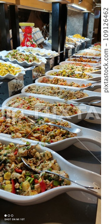 A huge assortment of salads in one of the hotel restaurants in Turkey A huge assortment of salads in one of the hotel restaurants in Turkey 109126462