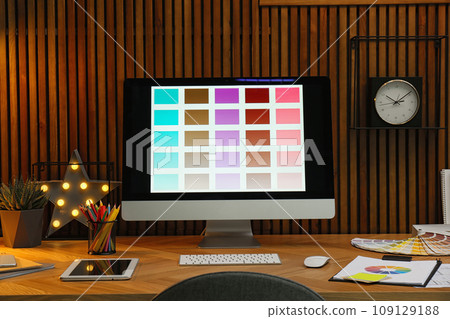 Modern designer's workplace with computer in office Modern designer's workplace with computer in office 109129188