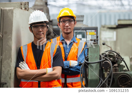 asian man engineer wear yellow helmet and uniform asian man engineer wear yellow helmet and uniform 109131235