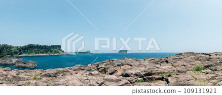 View of Seogwipo port Saeyeongyo Bridge and Munseom Island in Jeju Island, Korea View of Seogwipo port Saeyeongyo Bridge and Munseom Island in Jeju Island, Korea 109131921