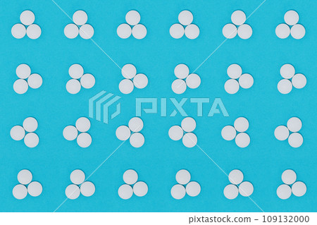 Dose of three white pills, seamless background, on blue. Dose of three white pills, seamless background, on blue. 109132000