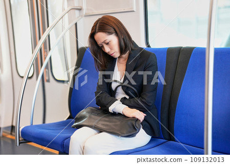 A woman feels unwell on the train A woman feels unwell on the train 109132013