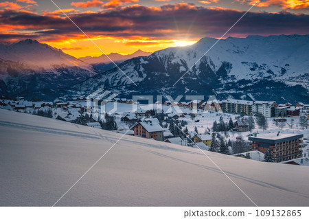 Ski resort with deep snow at sunrise, La Toussuire, France Ski resort with deep snow at sunrise, La Toussuire, France 109132865