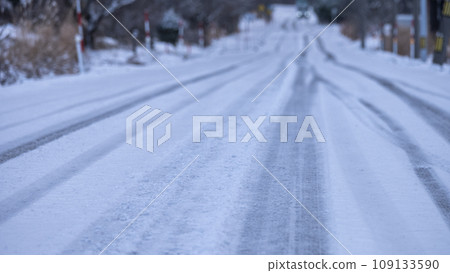 Snow-covered road  109133590