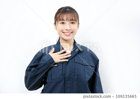 Image of a woman wearing work clothes Image of a woman wearing work clothes 109135665