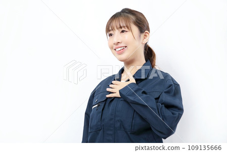Image of a woman wearing work clothes Image of a woman wearing work clothes 109135666