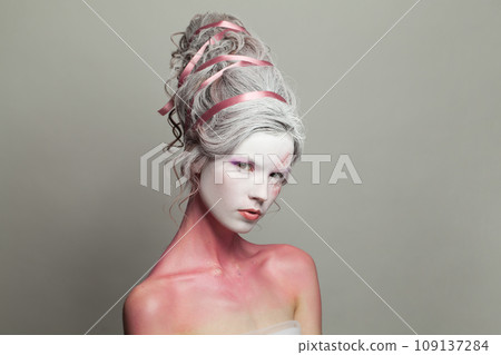 Cool woman with makeup. Halloween and theatre concept. 109137284