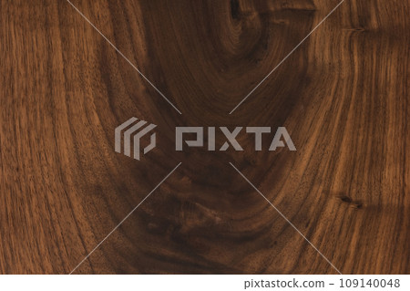 Black walnut wood texture with oil finish closeup 109140048