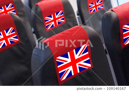 Empty seat in plane with UK Flag. Travel, flight and transportration in United Kingdom concept 109140167