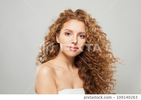 Nice woman fashion model with long wavy hairstyle, natural makeup and clear skin. Nice woman fashion model with long wavy hairstyle, natural makeup and clear skin. 109140263