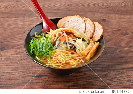 Miso vegetable ramen. Stir-fried vegetable topping of bean sprouts, onions, carrots, green onions, and wood ear mushrooms. 109144822