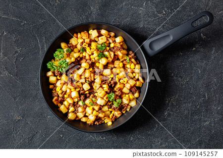Beef Hash with roasted corn, garlic and parsley Beef Hash with roasted corn, garlic and parsley 109145257