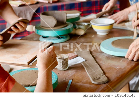 Elderly women doing pottery 1 Elderly women doing pottery 1 109146145