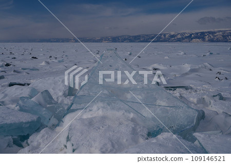 On the ice of Lake Baikal. beautiful pieces of ice. Ice hummock on the ice of lake Baikal 109146521